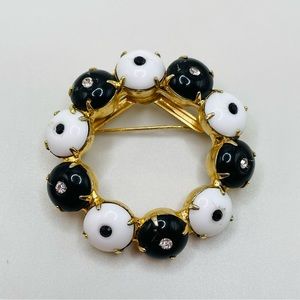 Vintage high end unsigned black & white oval wreath brooch